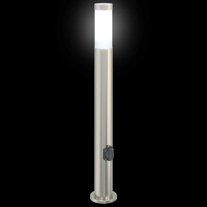 A lit stainless steel bollard light with an outlet