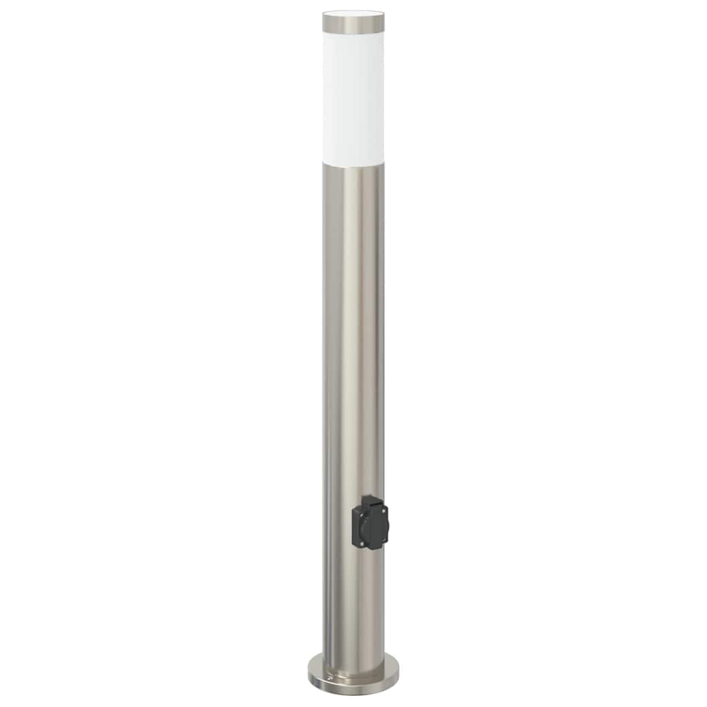 A single stainless steel bollard light with an outlet