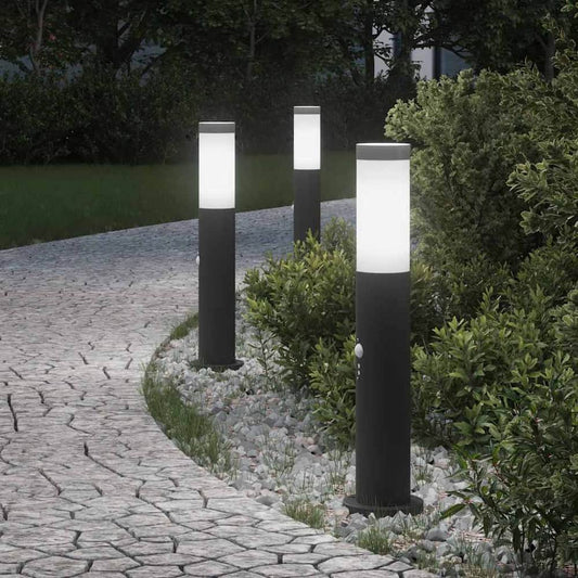 vidaXL Bollard Lights with sensor, three tall cylindrical lamps with white tops and dark bases, set along a garden path
