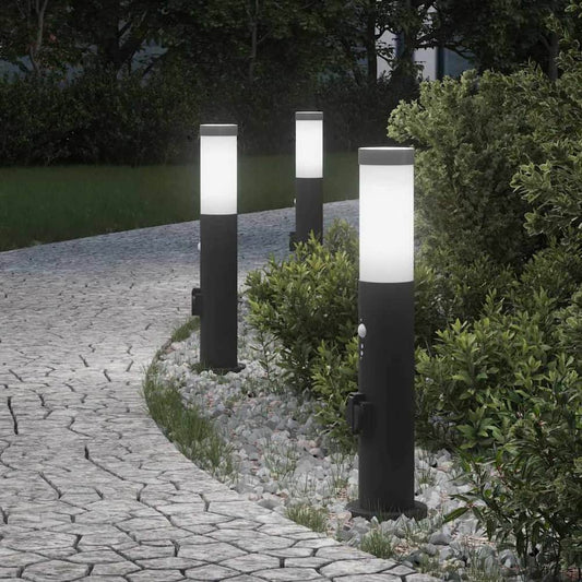 vidaXL Bollard Lights with Sensor&Outlet 3pcs 50 cm standing on a paved garden path