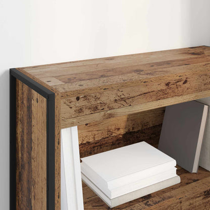 Close up of the rustic wood grain and black metal frame of the book cabinet