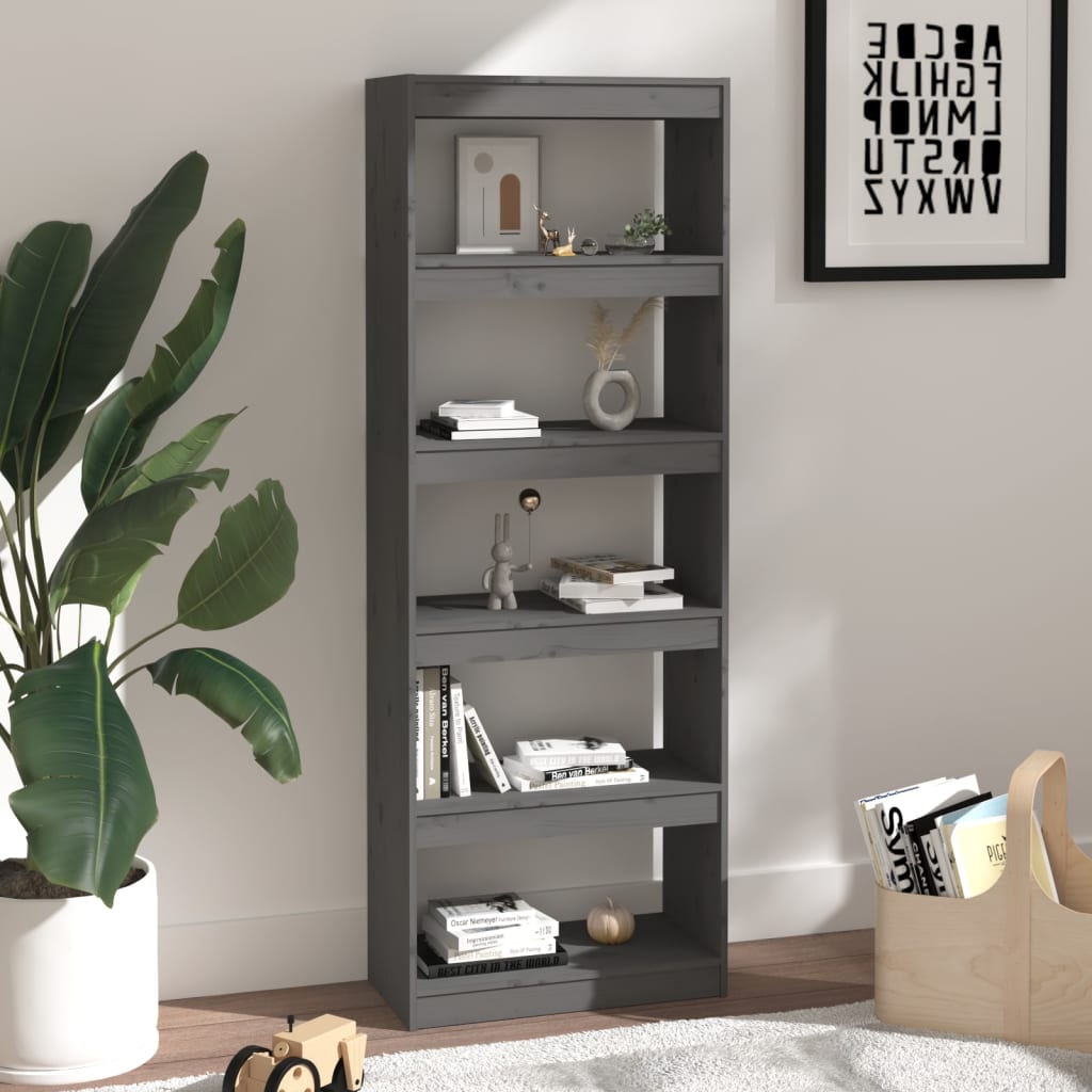 The room divider styled with books and ornaments in a modern living room interior