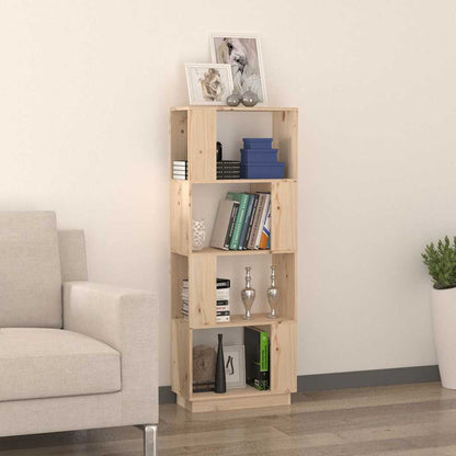 The standing shelf filled with books and ornaments next to a sofa in a home interior