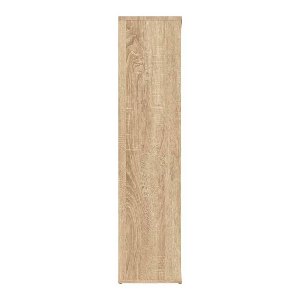 Side view of the book cabinet, showing its depth and wood grain