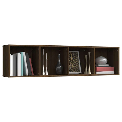 A close-up of the open shelving unit showing books and decorative vases