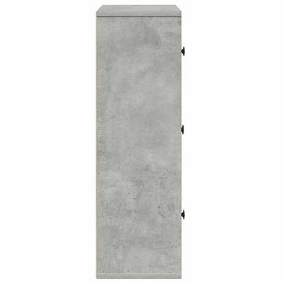 The side panel of the bookcase showing the smooth concrete grey surface