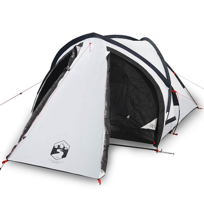 The white two-person camping tent with the door open, showing the black interior