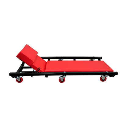 The adjustable vehicle repair creeper with its headrest raised to a higher position