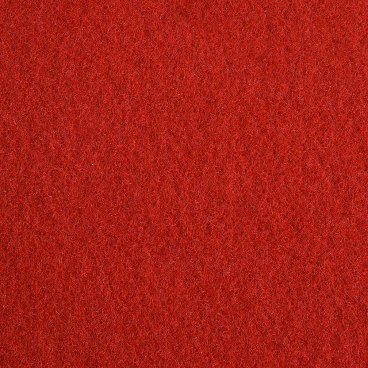 the door mat surface showing a close-up of the dense red fabric texture and material weave