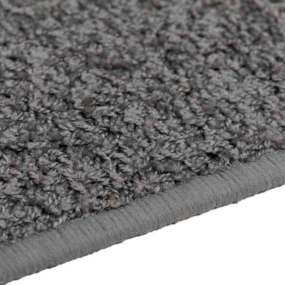 Detail of the edge binding on the grey carpet runner