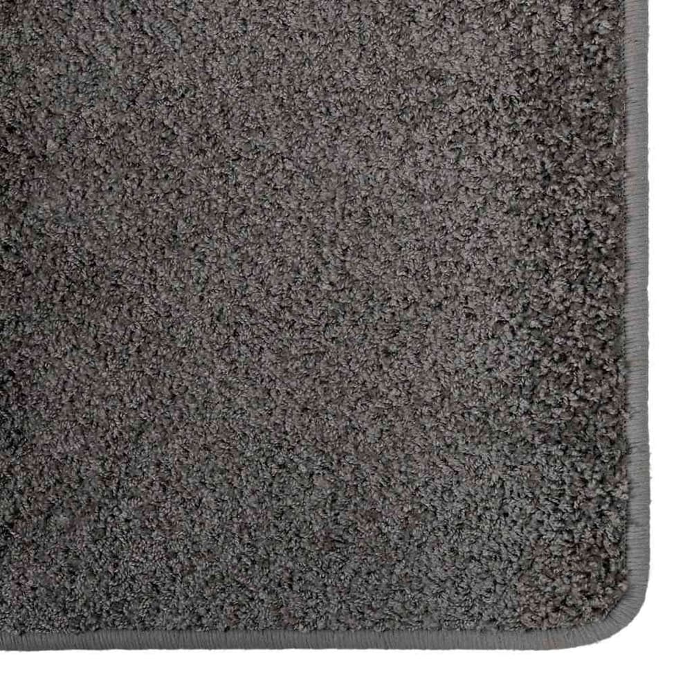 Close-up of the grey carpet runner showing the texture of the pile
