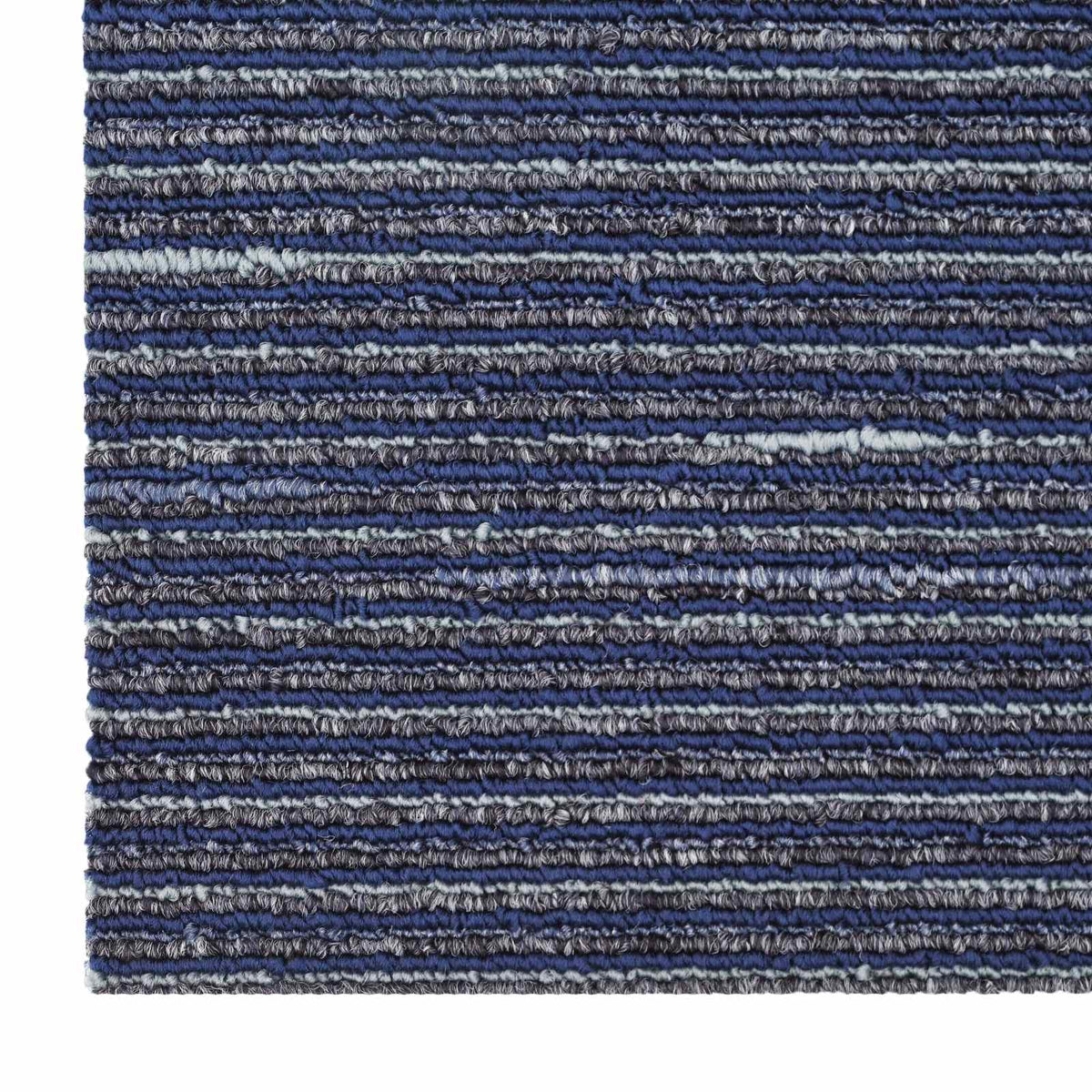 Detailed texture of the blue carpet tile surface
