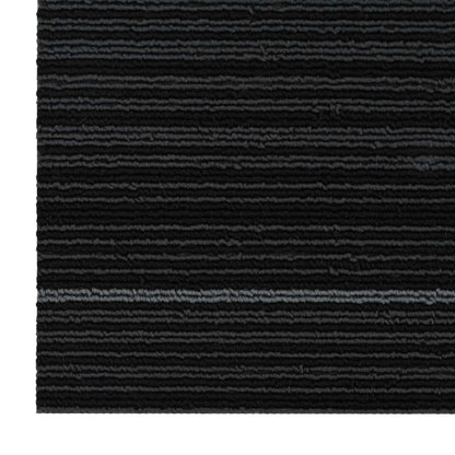Extreme close up of the striped dark grey carpet tile surface