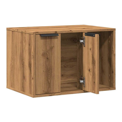 The wooden cat litter box enclosure with one door open showing hinges
