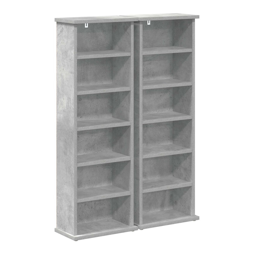 Two concrete grey media storage cabinets side by side, empty shelves