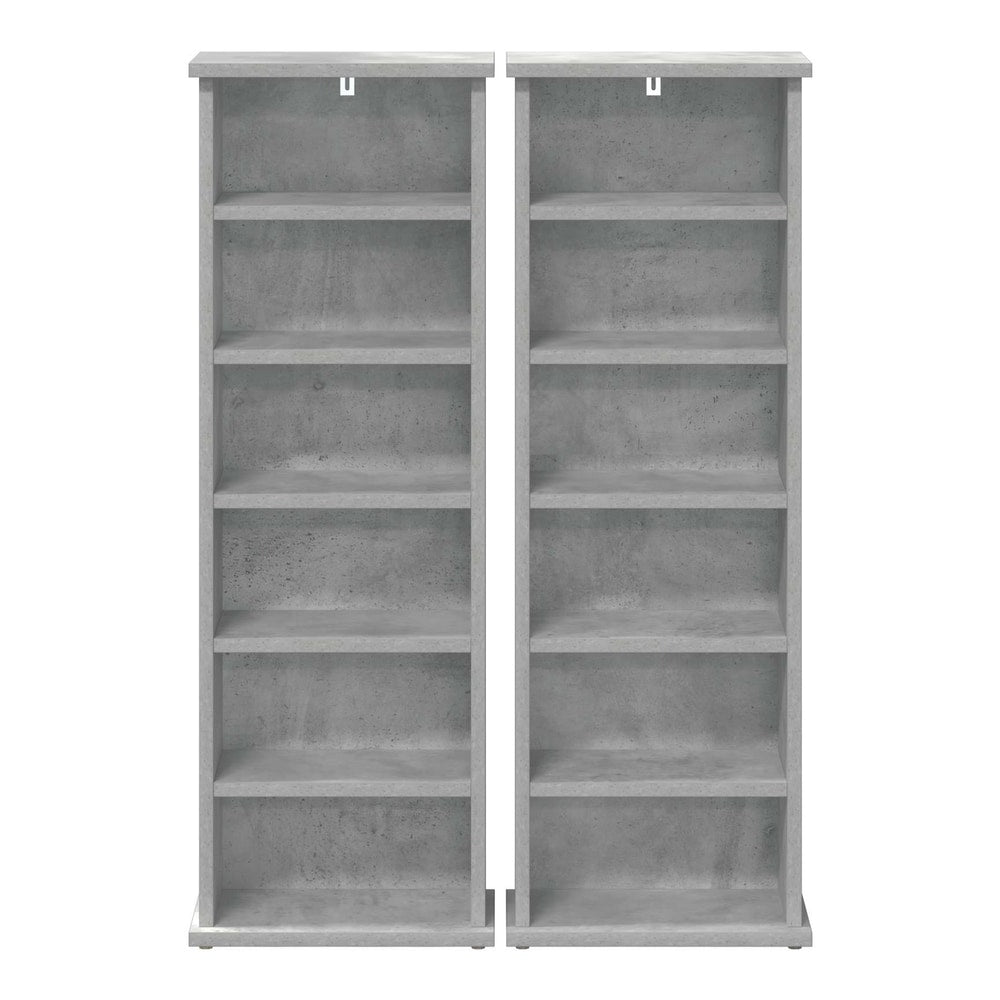 Two concrete grey media storage cabinets viewed from the front