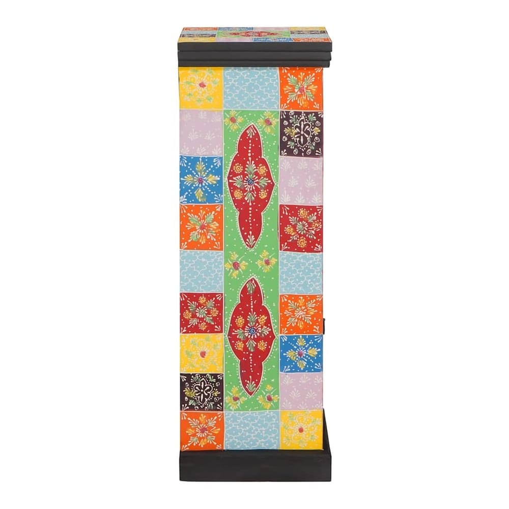 The chest of drawers showing the colourful patterned side panel with floral motifs