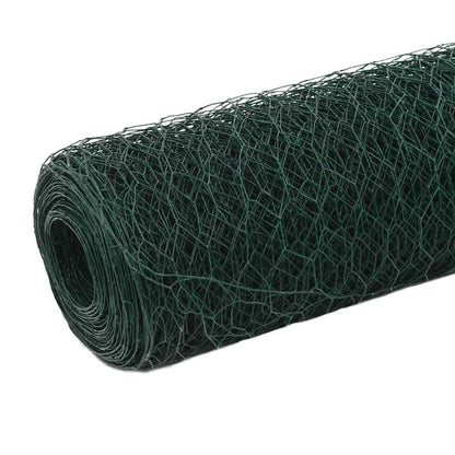 A close-up of the green PVC coated steel wire mesh fencing, showing the hexagonal pattern
