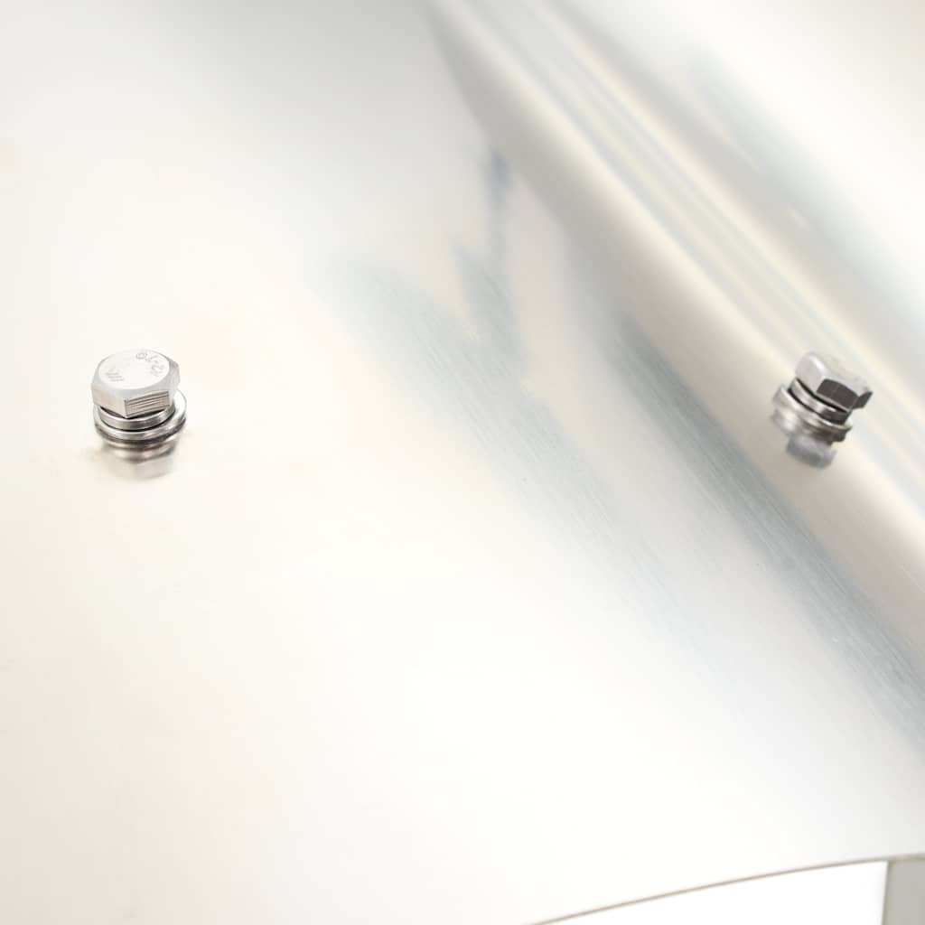 Close-up of the stainless steel top panel with visible bolts on the chimney cowl