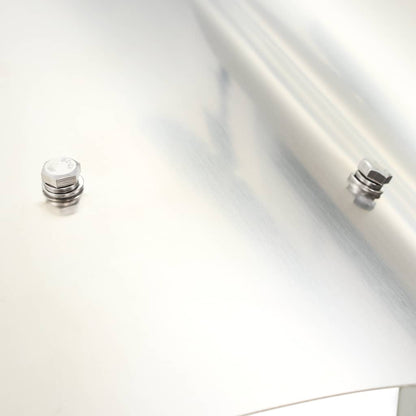 Close-up of the stainless steel top panel with visible bolts on the chimney cowl