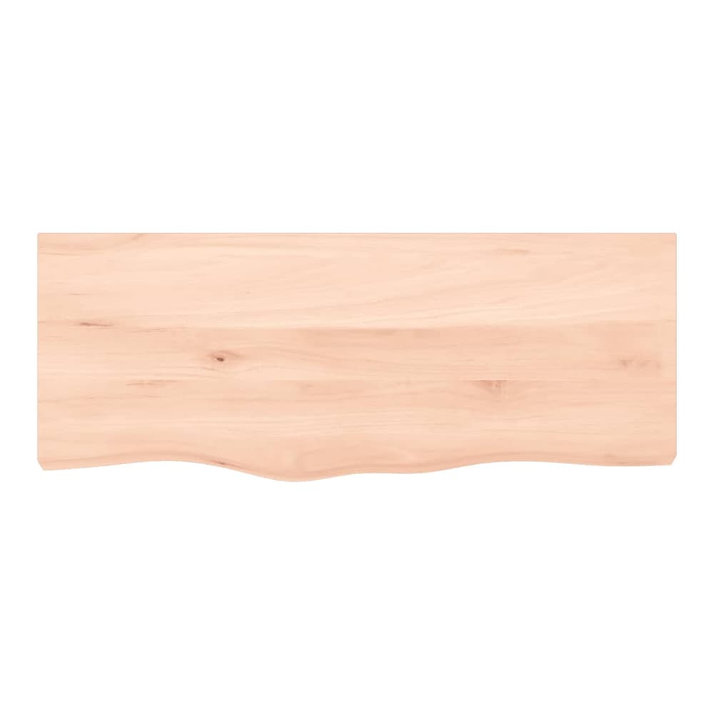 A close-up of the untreated solid wood countertop, highlighting its smooth surface