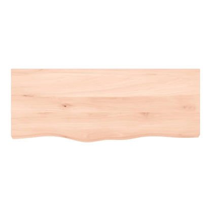 A close-up of the untreated solid wood countertop, highlighting its smooth surface