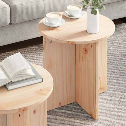 Two natural wood coffee tables in a room setting