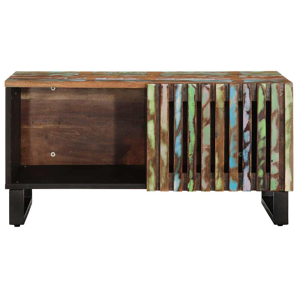 The coffee table has a slatted door on the right and an open compartment on the left