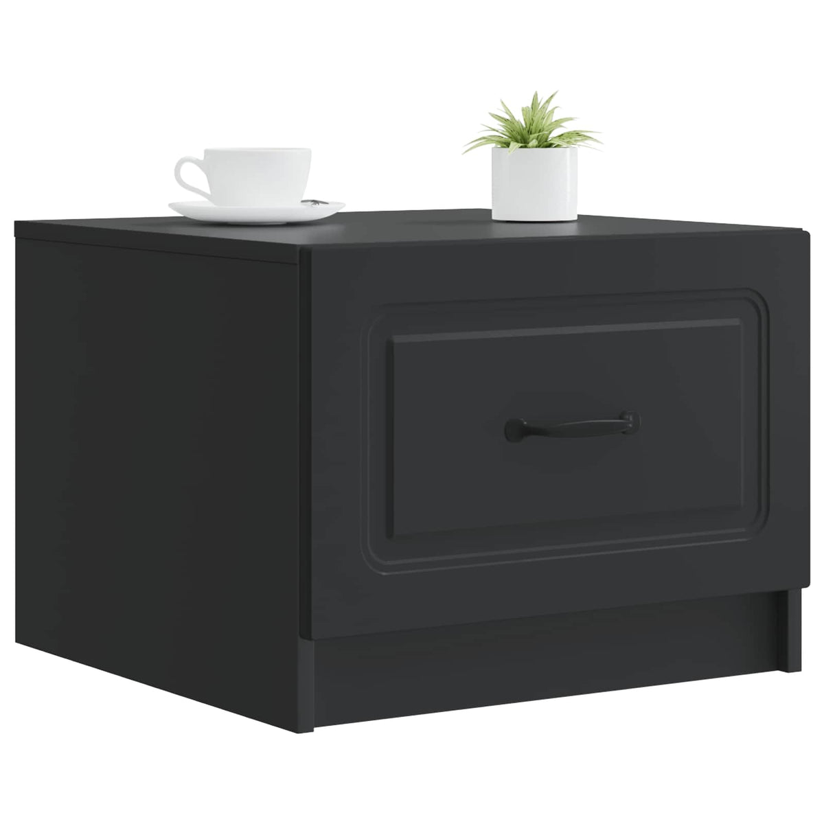 The coffee table with a white cup and a small potted plant on the top surface