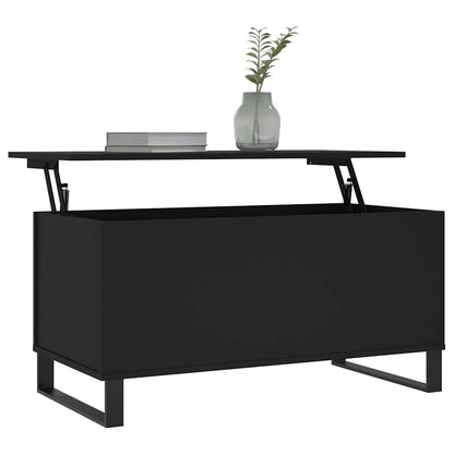 The coffee table with its top partially lifted showing a book and vase