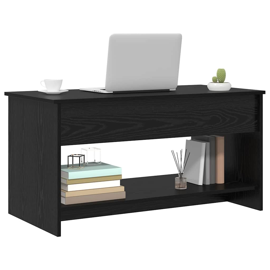 black oak engineered wood coffee table with books and a laptop