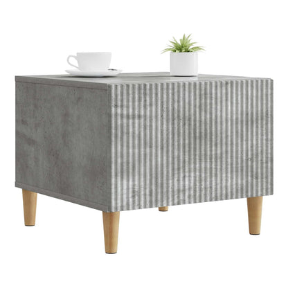 Grey engineered wood coffee table with a ribbed front panel and four tapered legs