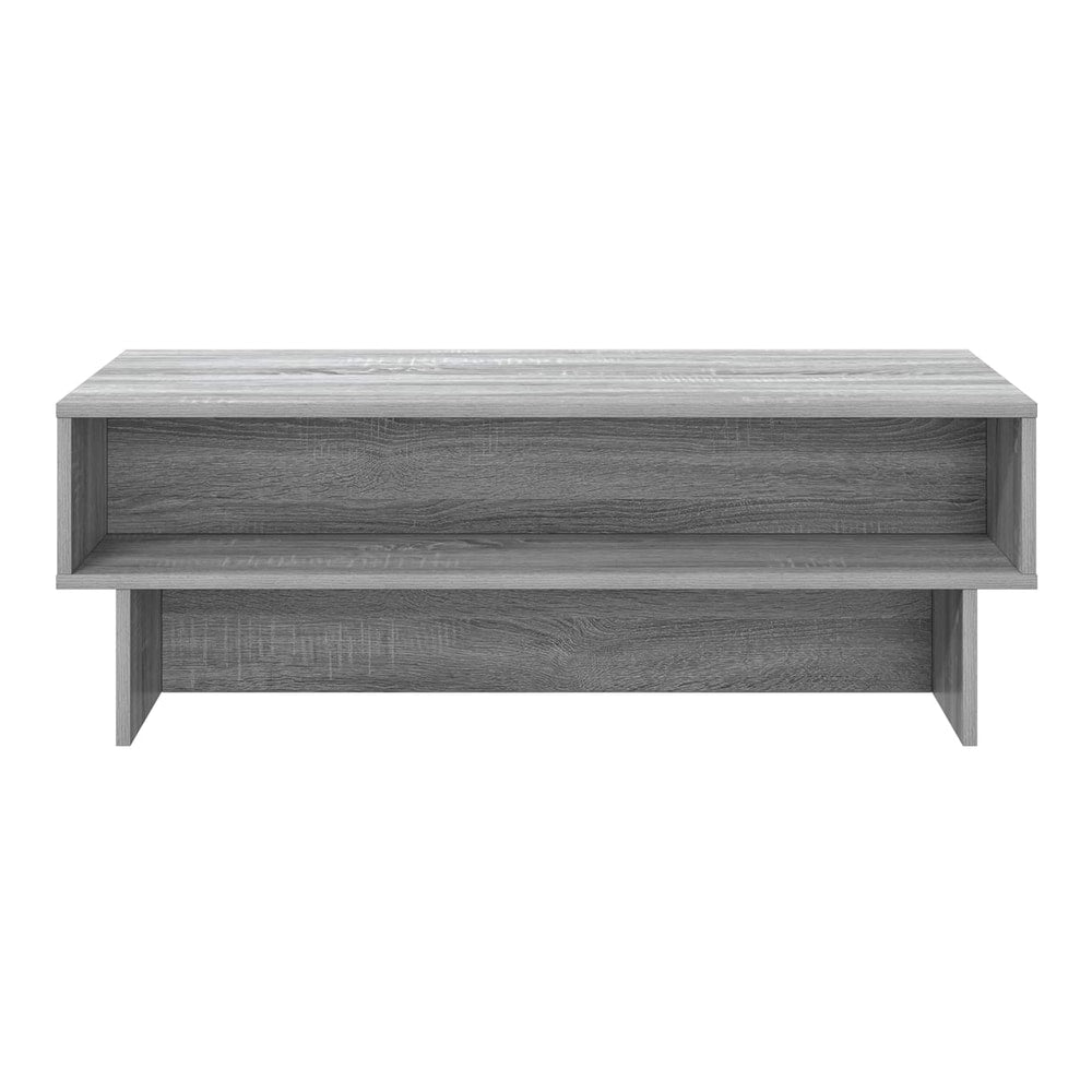 A grey Sonoma engineered wood coffee table with a shelf, viewed from the front