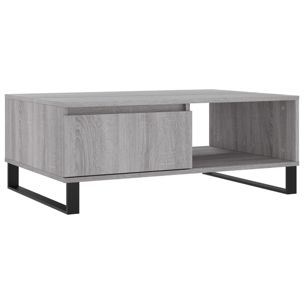 The grey coffee table with a drawer and open shelf, shown from the front