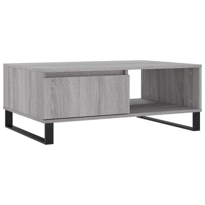 The grey coffee table with a drawer and open shelf, shown from the front