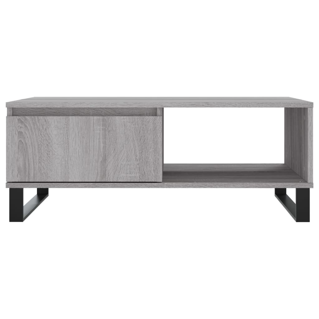 A grey coffee table with a drawer and open shelf, isolated on a white background