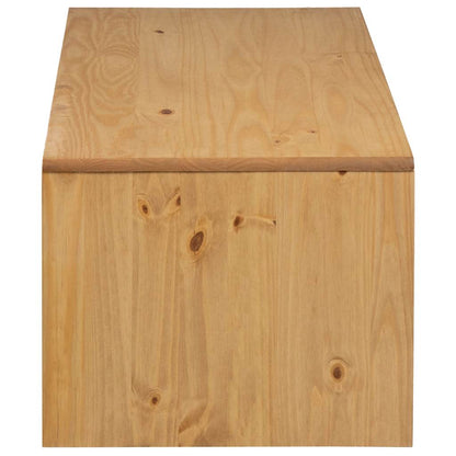 Close-up of the side panel of the pine coffee table showing wood grain