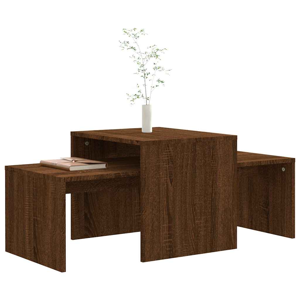 Brown oak engineered wood coffee tables with a vase and book on top