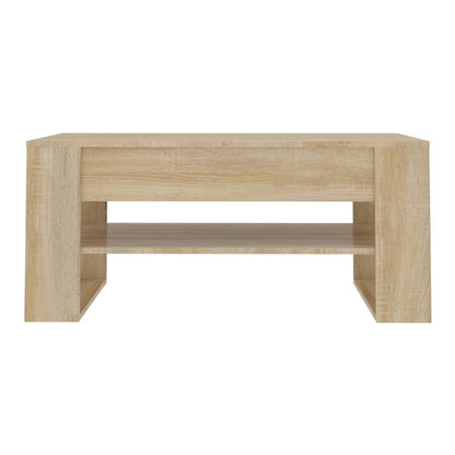 The coffee table has a simple rectangular design with two open shelves underneath