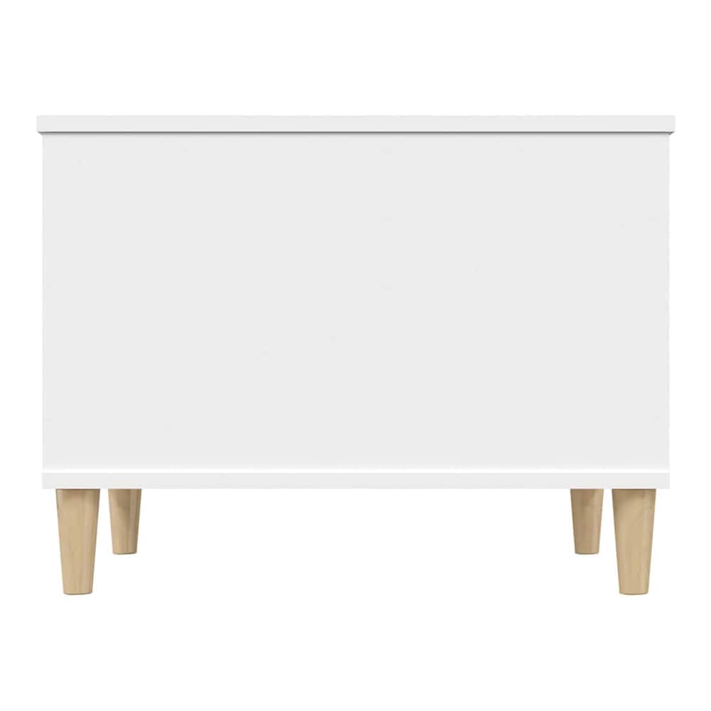 Front view of the white coffee table on its wooden legs