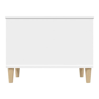 Front view of the white coffee table on its wooden legs