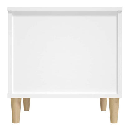 Underside of the white coffee table showing its four legs