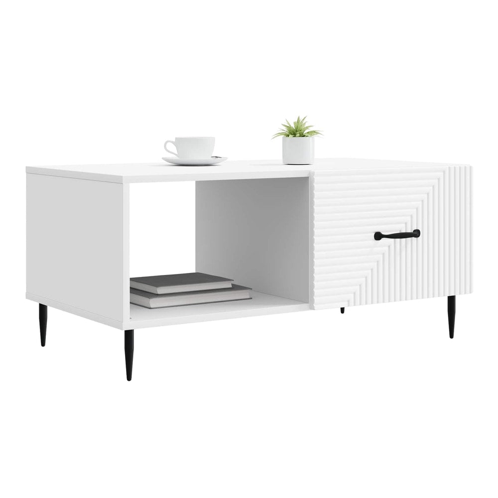 White coffee table with a cup and plant on top, showing the open shelf and ribbed drawer