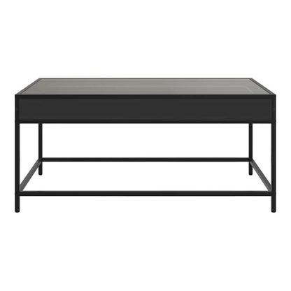 The coffee table from the front, showing its rectangular shape and black finish