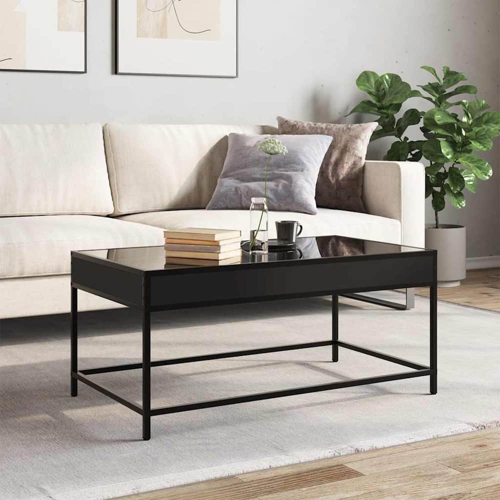 The coffee table with infinity LED in a living room setting next to a sofa