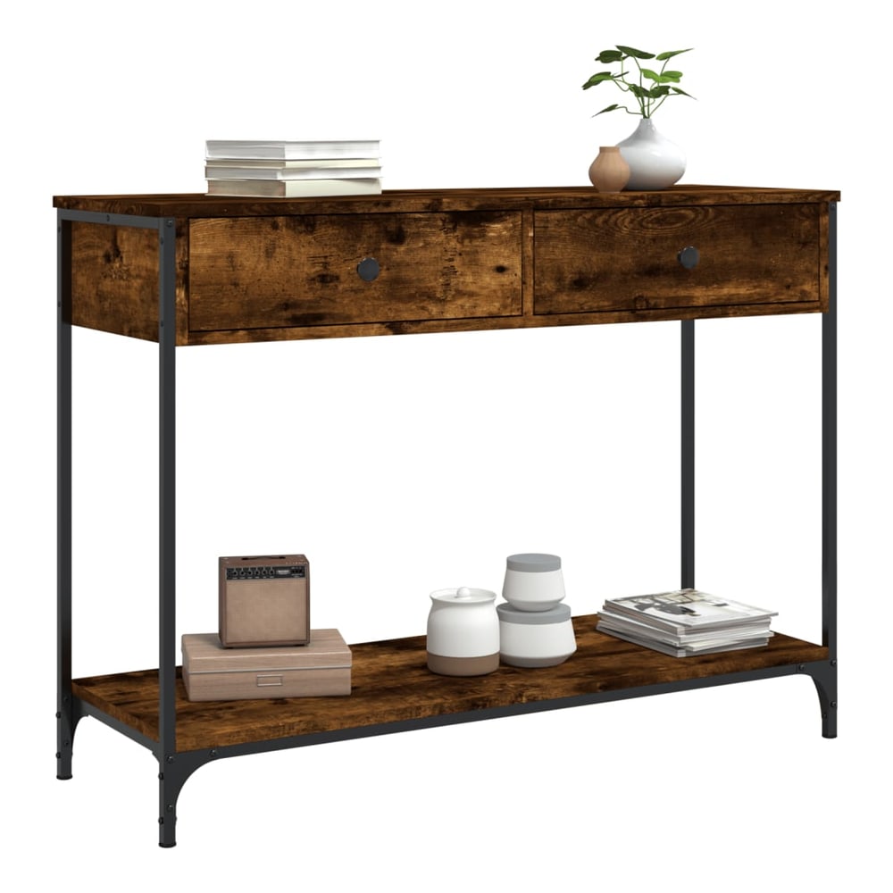 This console table has two drawers and a lower shelf, shown with decorative items