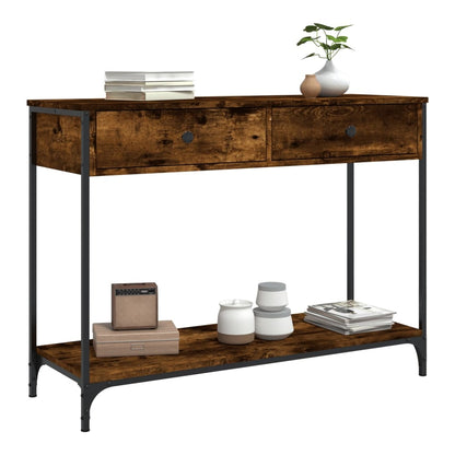 This console table has two drawers and a lower shelf, shown with decorative items