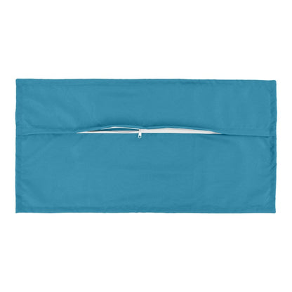 The back of a light blue cushion cover showing a zip fastener