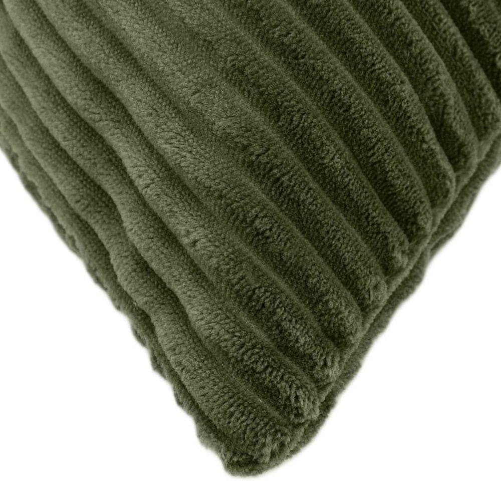Close-up of the green corduroy fabric showing the ribbed texture