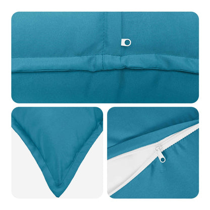 Close up details of a light blue cushion cover showing stitching and zip